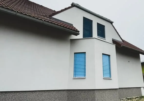 Rolety a žaluzie — realizace